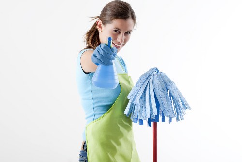 Cleaning staff and equipment representing ethical operations at Hampton Hill Carpet Cleaners