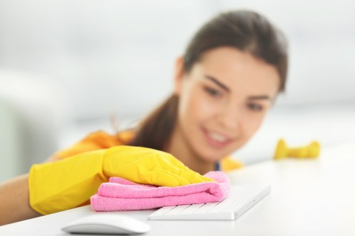 Technician checking carpet cleaning equipment before use